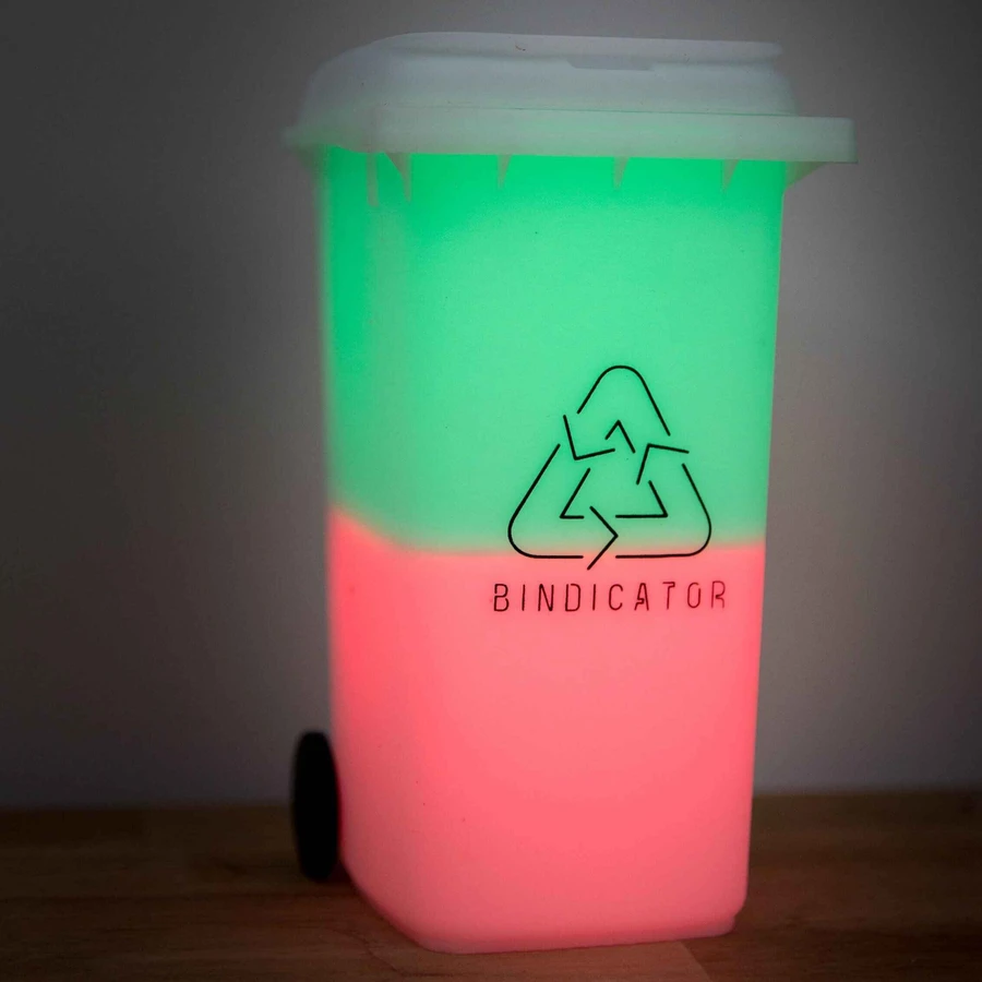 Bindicator lamp glowing in two bin colours on a kitchen shelf